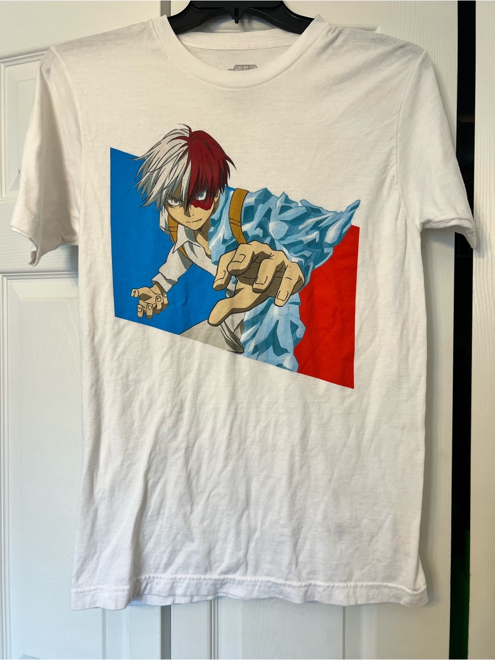 White Graphic Tee with Red & Blue Anime Print- medium